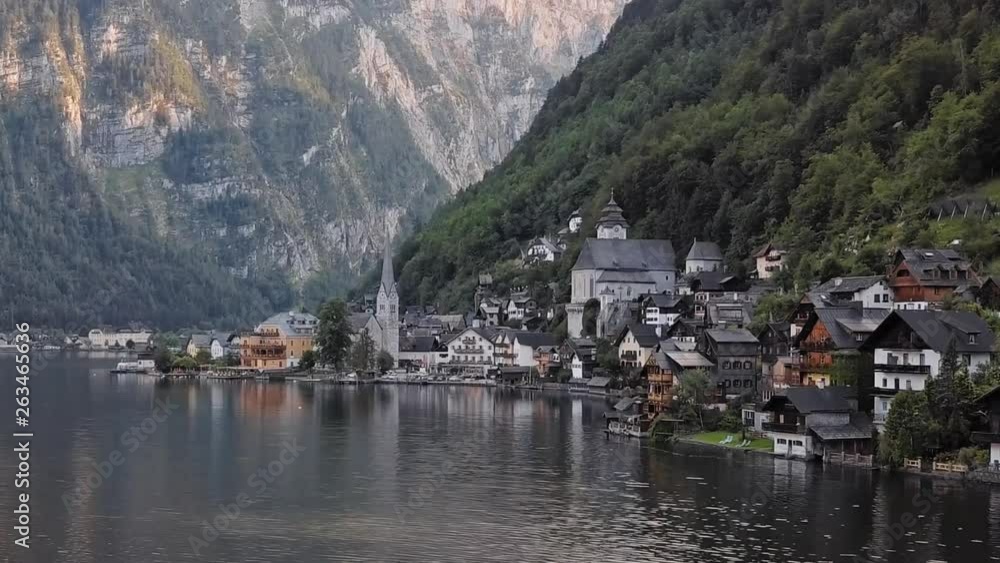 Flight over Hallstatt village over Hallstatter See, in Salzkammergut, Upper Austria. Flight over Hallstatt village over Hallstatter See, in Salzkammergut, Upper Austria.