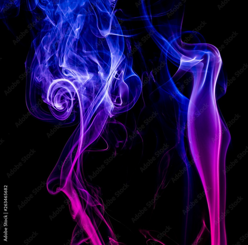 Obraz premium Colored smoke on black background