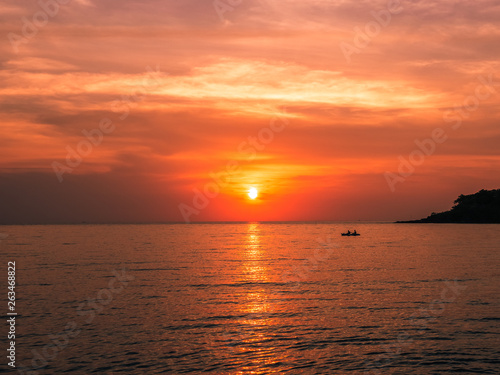 Orange sky in the evening during the sunset (Koh Kood) © Prasertsit