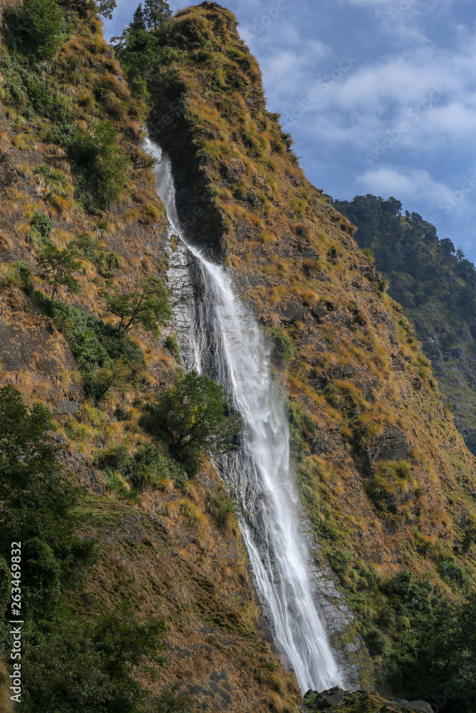 A waterfall in the himalayas A waterfall in the himalayas