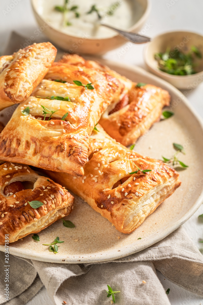 Fresh sausage roll with tatar sauce and herbs Fresh sausage roll with tatar sauce and herbs