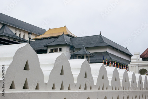 Exterior white wall of Temple of the Tooth in Kandy  © cceliaphoto