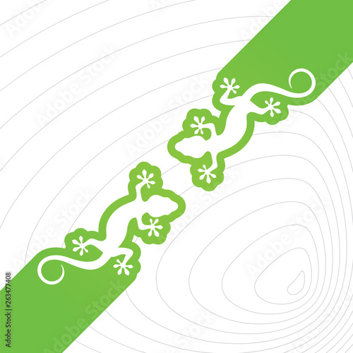 Two crawling lizards against each other on a green background