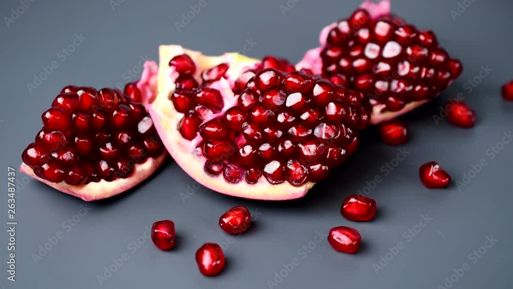 Rotating india pomegranate Seeds on black background in 4K resolution Rotating india pomegranate Seeds on black background in 4K resolution