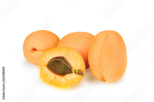 Group of ripe apricotes isolated with clipping path photo