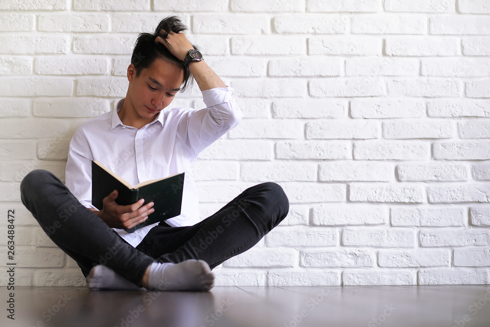 Asian young man student with books Asian young man student with books