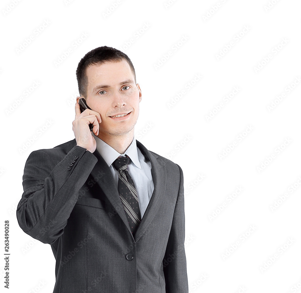 businessman with a leather briefcase talking on his mobile phone businessman with a leather briefcase talking on his mobile phone