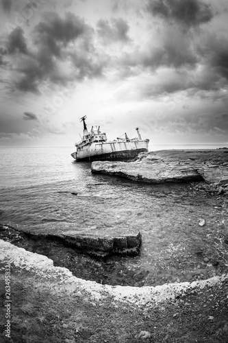 Panorama of cargo vessel "Edro III" shipwreck near rocky coast in Mediterranean sea at Paphos, Cyprus