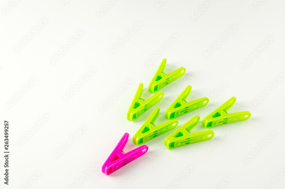 clothespin made of colorful plastic on white background clothespin made of colorful plastic on white background