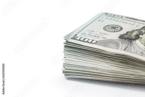 Stack of hundred dollars isolated on white