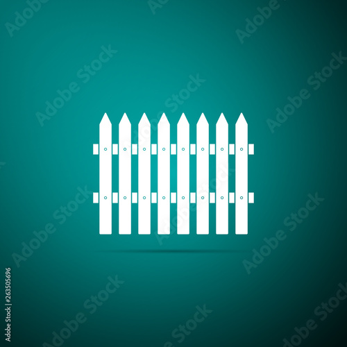 Fence wooden icon isolated on green background. Garden fence sign. Flat design. Vector Illustration