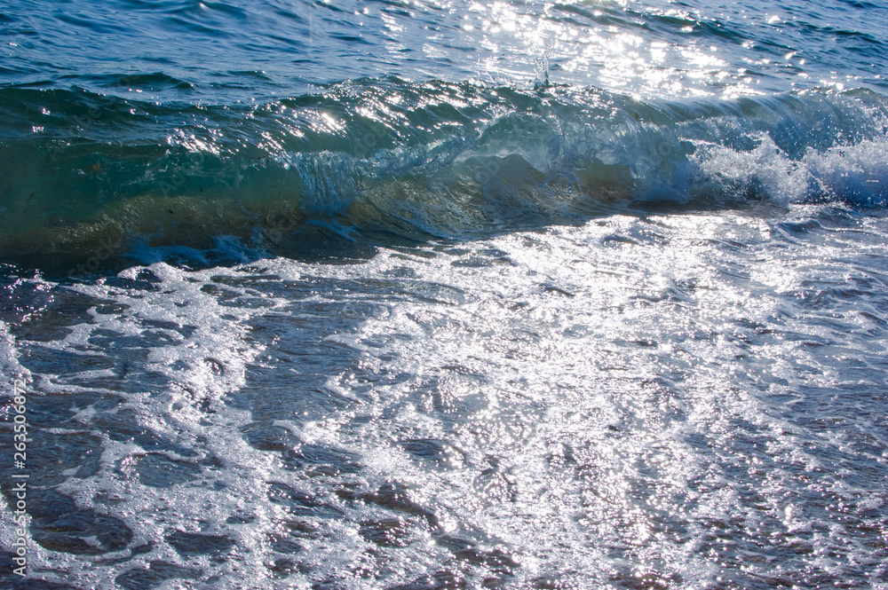 foam of splashing water with sun lights and sparkles at late afternoon, background of foam and water, full frame foam of splashing water with sun lights and sparkles at late afternoon, background of foam and water, full frame