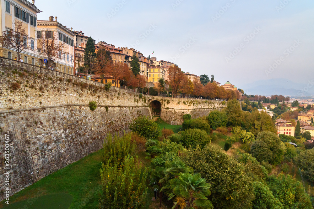 View of Bergamo with Sant Andrea platform of Venetian Walls in evening. Italy