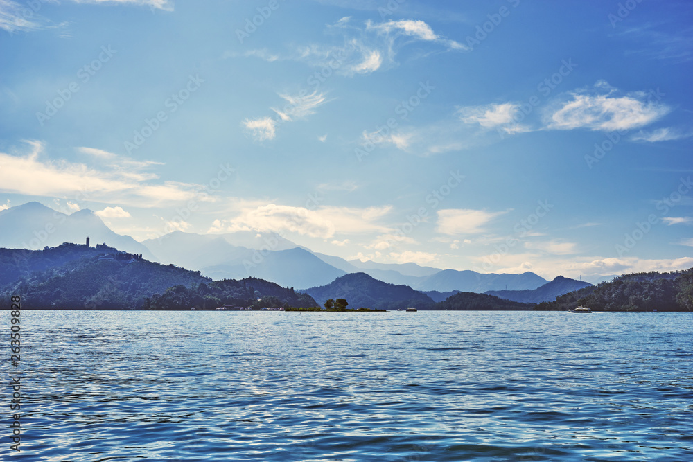 Beautiful nature scenics of Sun Moon Lake with the surrounding mountains are the highlight at this sprawling lake at Yuchi, Nantou in Taiwan.