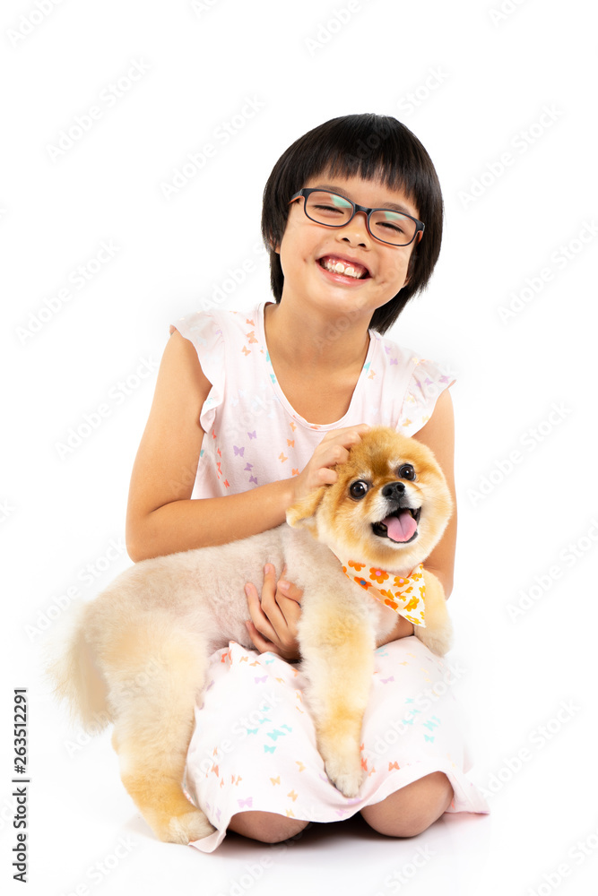 Isolated portrait of young female veterinarian with eyeglasses checking up Pomeranian dog in veterinary clinic. Studio shot of girl and puppy on white background Isolated portrait of young female veterinarian with eyeglasses checking up Pomeranian dog in veterinary clinic. Studio shot of girl and puppy on white background