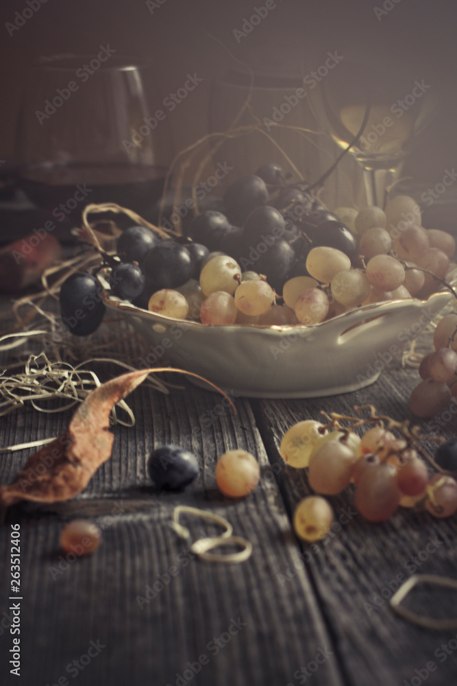 glasses of red and white wine and grapes glasses of red and white wine and grapes