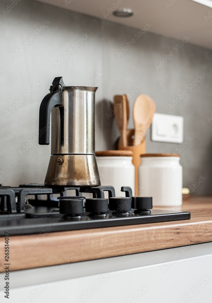 Preparing a traditional italian style coffee with coffee percolator. Making a coffe. Preparing a traditional italian style coffee with coffee percolator. Making a coffe.