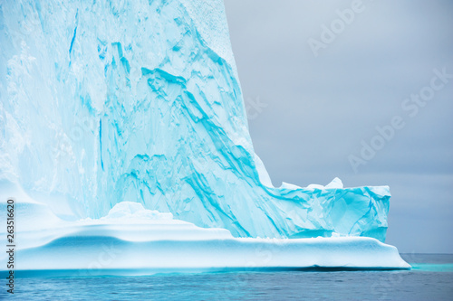 Fototapeta Blue icebergs in the Atlantic ocean in Ilulissat icefjord, Greenland