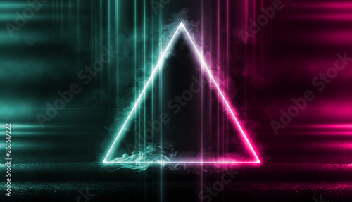 Empty background scene. Rays of neon light in the dark, neon figure of a triangle, smoke. Night view of the street, the city. Abstract dark background.