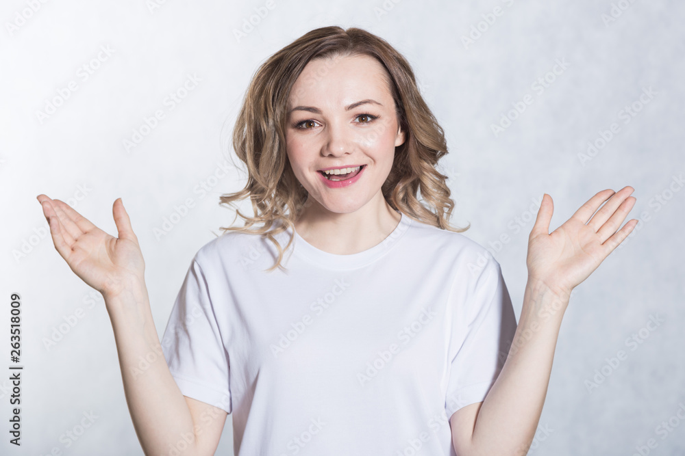 Beautiful young woman showing something big gesture by hands. Beautiful young woman showing something big gesture by hands.