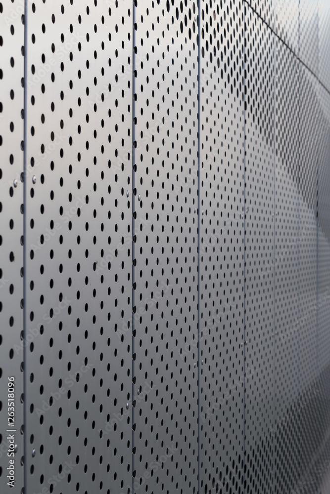 Perforated metal panel. Facing of buildings and structures perforated