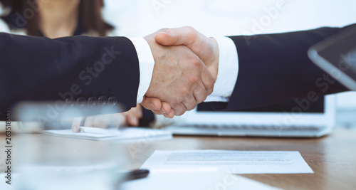 Business people shaking hands at meeting or negotiation in the office. Handshake concept. Partners are satisfied because signing contract