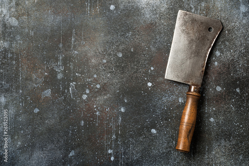Cooking background with vintage butcher cleaver