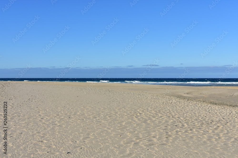 Beach with waves and blue sky. Galicia, Spain. Beach with waves and blue sky. Galicia, Spain.