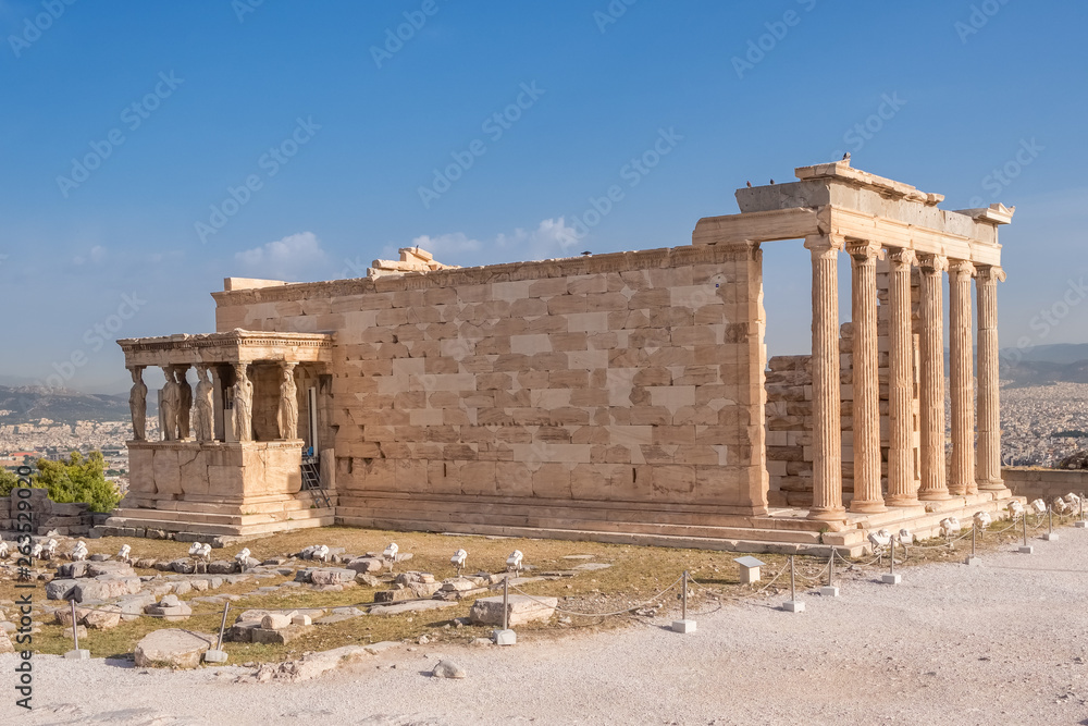Obraz premium Ruins of the Temple of Erechtheion at the Acropolis hill in Athens
