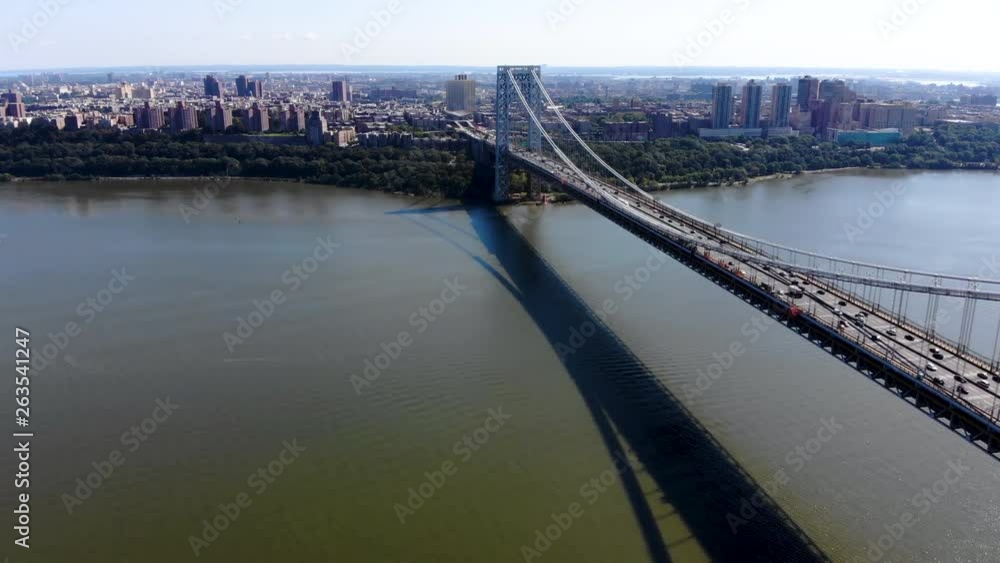 Aerial view of George Washington Bridge in Fort Lee, NJ. George Washington Bridge is a suspension bridge spanning the Hudson River connecting NJ to Manhattan, NY. Panorama of GWB during summer Aerial view of George Washington Bridge in Fort Lee, NJ. George Washington Bridge is a suspension bridge spanning the Hudson River connecting NJ to Manhattan, NY. Panorama of GWB during summer