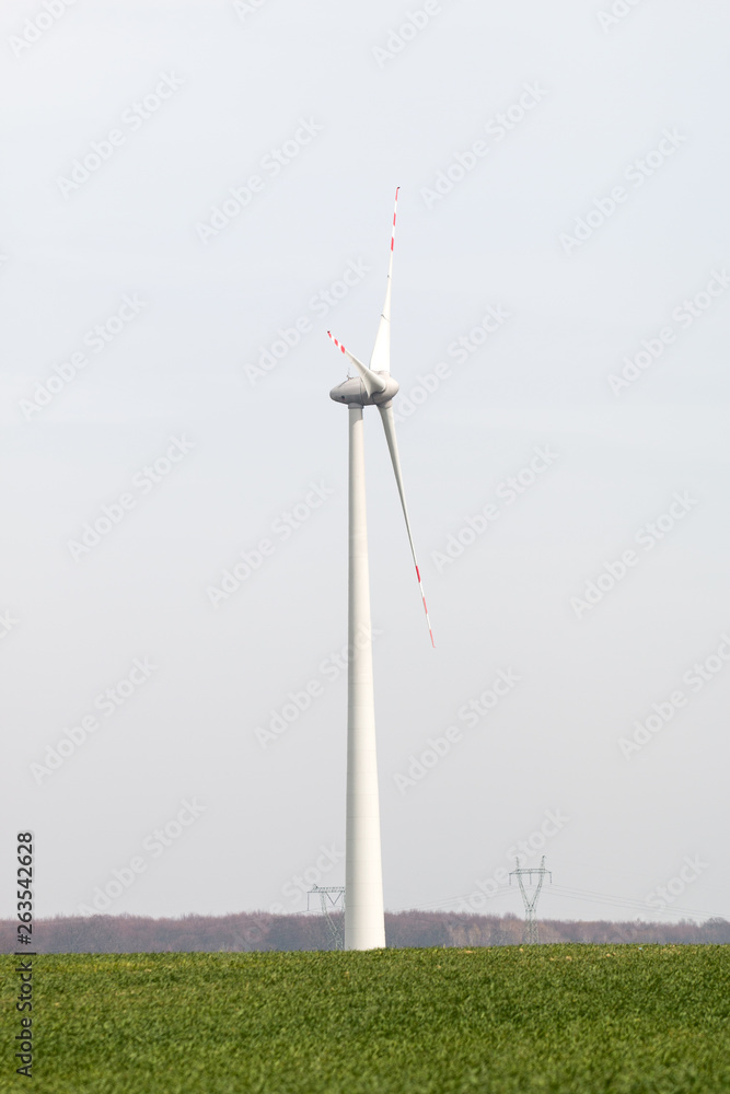 wind farm with windmill from far away wind farm with windmill from far away