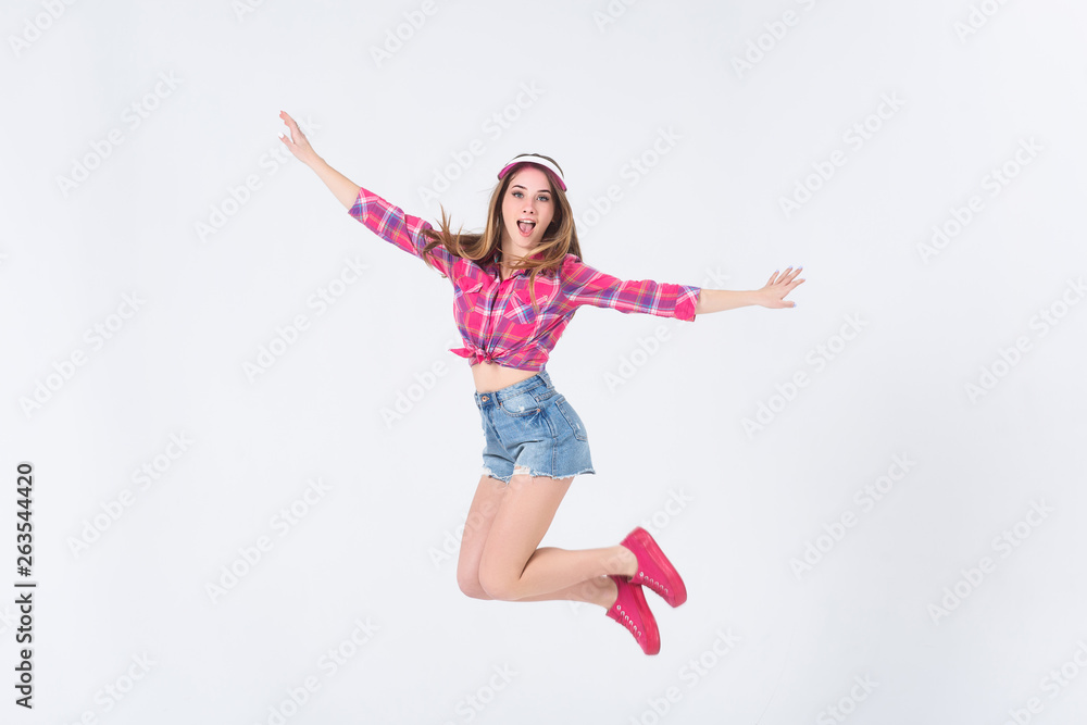 Attractive blonde wonan running in the air, on white background! Attractive blonde wonan running in the air, on white background!