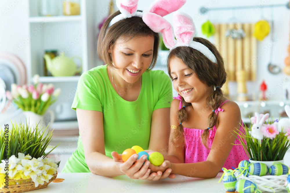 Portrait of mother and daughter with Easter eggs Portrait of mother and daughter with Easter eggs