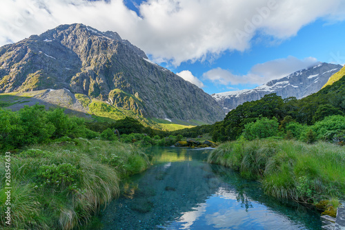 wooden bridge over river in the mountains, fiordland, new zealand 1