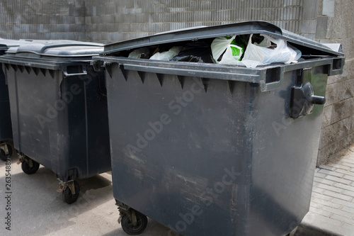 Black plastic trash containers for separate collection and sorting of garbage for environmental protection