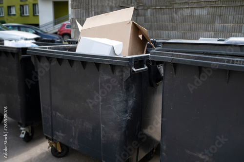 Black plastic trash containers for separate collection and sorting of garbage for environmental protection