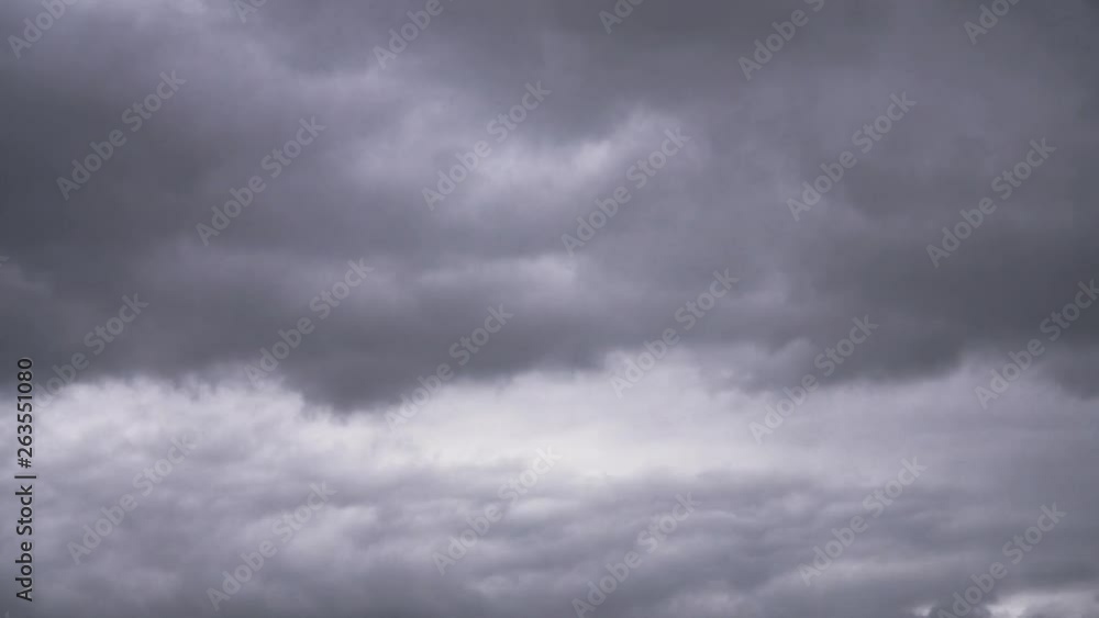 A dramatic thunderstorm clouds fly in the sky A dramatic thunderstorm clouds fly in the sky