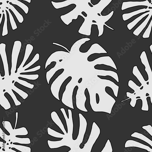 Monochrome tropical jungle leaves vector seamless black and white pattern