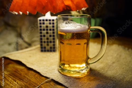 Glass of light beer in a krogs restaurant in Latvia photo