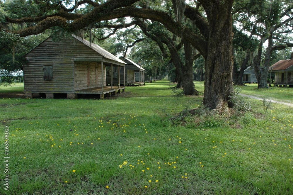 Slave cabins at Evergreen Plantation, located on the west side of the Mississippi River in St. John the Baptist Parish, constructed in 1790, Wallace, Louisiana, USA.