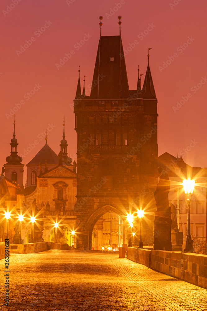 Prague's iconic Charles Bridgee at dawn
