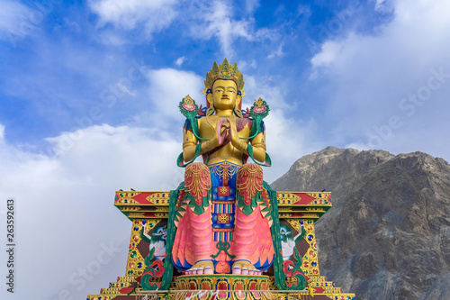 A statue of Maitreya Buddha at Diskit Monastery, Nubra Valley, Ladakh, Jammu and Kashmir, India. It is 32 meter tall statue of Budhha photo
