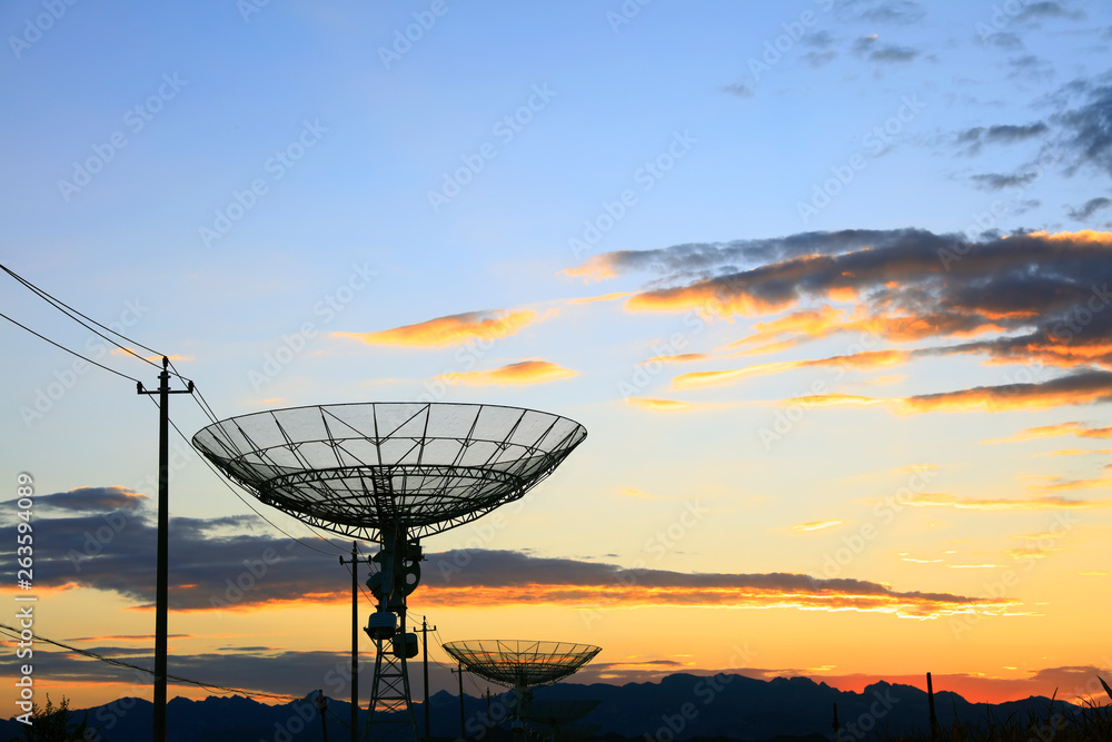 The silhouette of a radio telescope The silhouette of a radio telescope