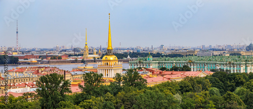 City skyline with the Admiralty spire, Peter and Paul Fortress, river Neva and Hermitage Winter Palace in Saint Petersburg, Russia photo