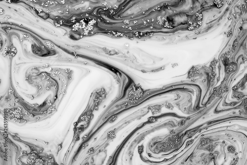 Beautiful abstract painting is a painting technique Ebru .Turkish Ebru style on the water with acrylic paints wring wave.Stylish combination of luxury.Contemporary art marble liquid texture 