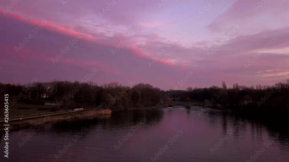 Aerial of river and bridge at sunset in Leipzig, Germany Aerial of river and bridge at sunset in Leipzig, Germany
