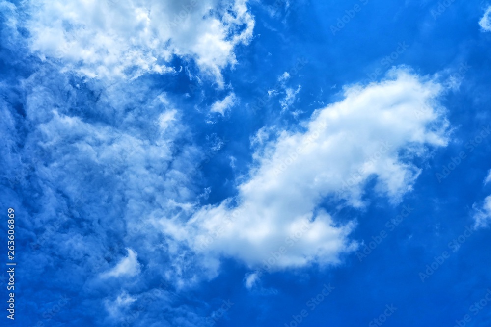 Obraz premium White Clouds with Blue Sky Background.