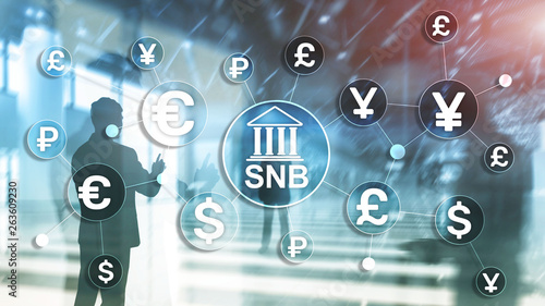 Different currencies on a virtual screen. SNB. Swiss National Bank.