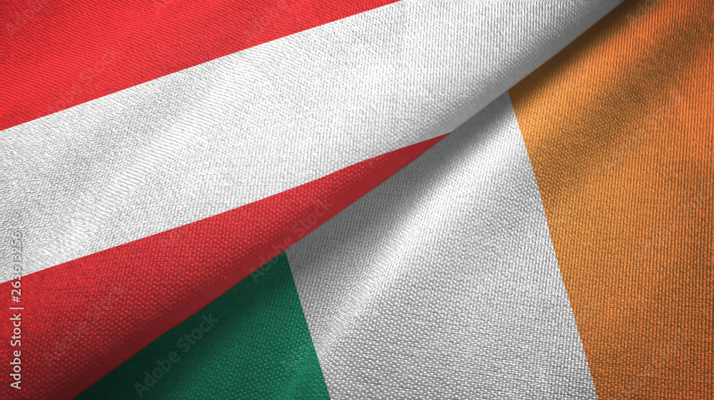 Fototapeta premium Austria and Ireland two flags textile cloth, fabric texture