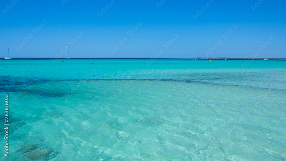 Fototapeta premium Colonia Sant Jordi, Spain. Amazing landscape of the charming beach Es Trenc. It has earned the reputation of Caribbean beach of Mallorca